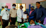Donor Receving Certificate after Donating the Blood