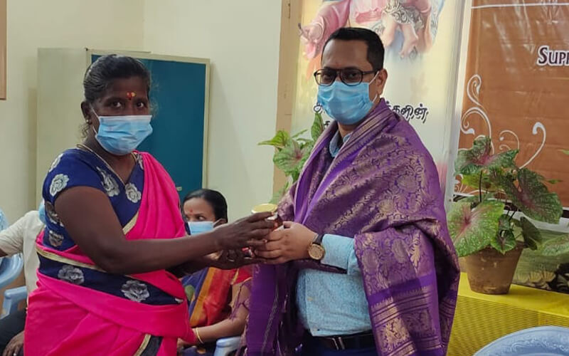 Beneficiary Felicitating Mr. Manoj Panda, CSR & Grant Manager DFT