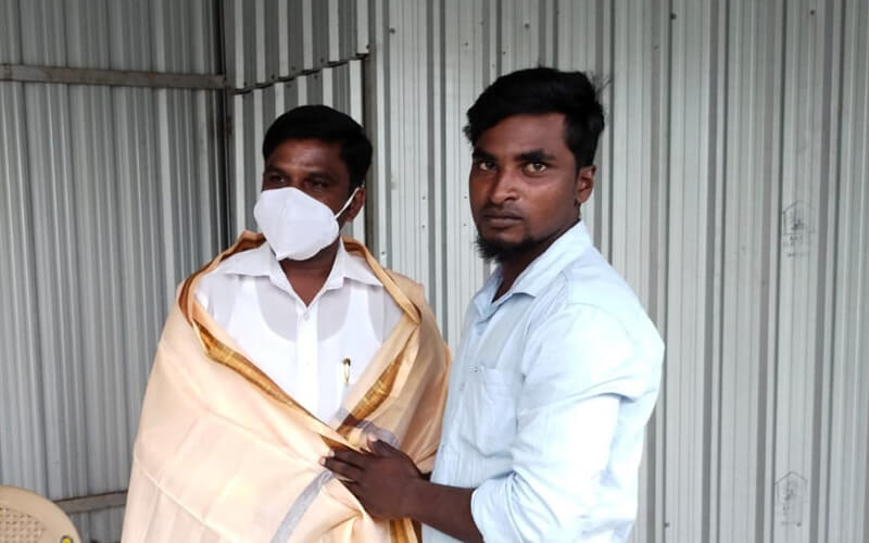 Felicitating the Chief Guest by HFH Volunteers