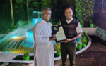 Fr. Agilan Sarprasadam SDB Hand Over The Award To The Founder Chairman of SPS Fr. Raj SDB