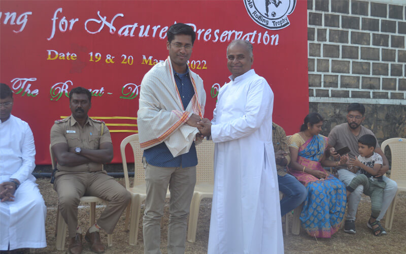 Fr. Arul Maran Felicitating Br. George Montfort ICSE Principal