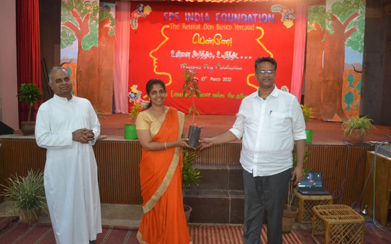 Fr. Don Bosco Distributing Saplings To Chief Guest