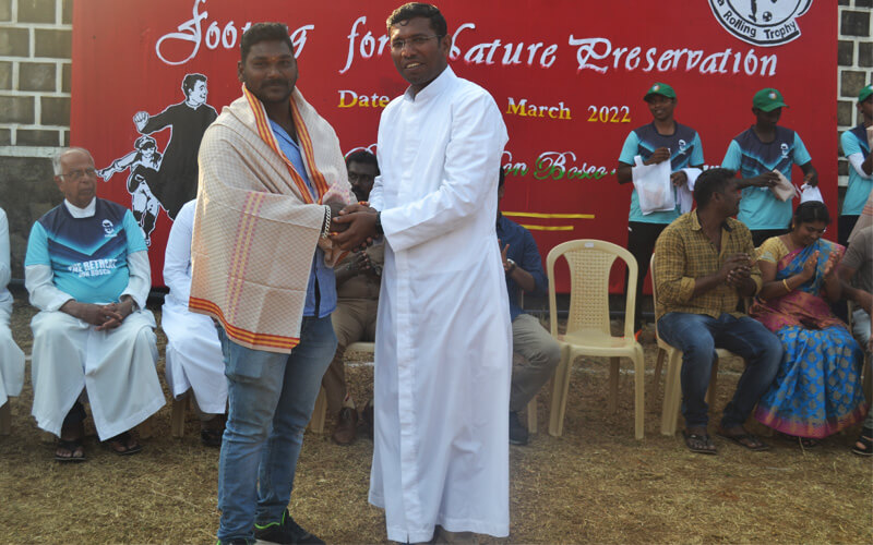 Fr. Selvakumar SDB, Felicitating Venkatesh G.R Sons Gym Coach